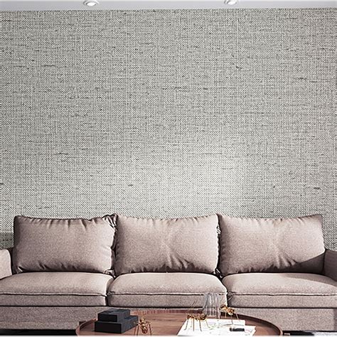 This oversized abstract wallpaper design with flat interlocking boulder shapes is available in bold ways and looks good on large expanses of walls. . Perigold wallpaper